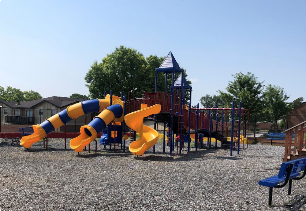 outdoor playground with multiple slides